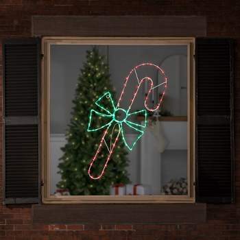 Northlight 28" Green and White LED Lighted Candy Cane with Bow Christmas Window Silhouette