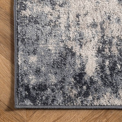 Reversible Abstract Blue Synthetic 4' x 6' Easy-Care Area Rug