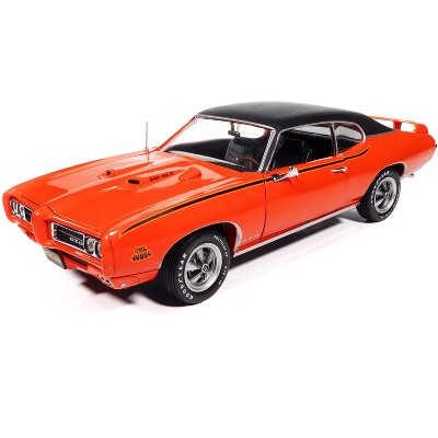 1969 Pontiac GTO Judge Carousel Red with Black Stripes and Black Vinyl Top "Mecum Auctions" 1/18 Diecast Model Car by Auto World