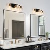 LNC Jacqueling 23.2-in 3-Lights Black and Polished Gold Clear Glass Bell Modern/Contemporary Bathroom Vanity Lights - 4 of 4