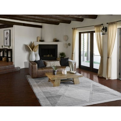 Geometric Black and Ivory Rectangular Synthetic Area Rug