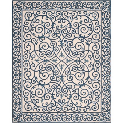 Ivory and Dark Blue Handmade Wool 6' x 9' Area Rug