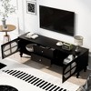 ORRD 68.9" Modern TV Stand for Living Room, Fits TVs up to 75", Entertainment Center with Fluted Glass Doors, 2 Drawers, Solid Wood Legs Black - 2 of 4