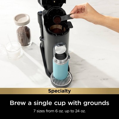 Black Single-Serve Coffee Maker with Integrated Milk Frother