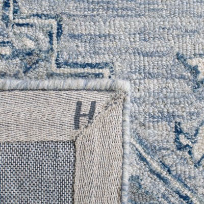 Handmade Light Blue Wool Tufted Rectangular Rug 5x8 Feet