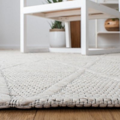 Ivory Flat Woven Wool and Synthetic 4' x 6' Area Rug