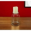 HomeRoots 8" Clear Glass Centerpiece Pillar Candle Holder With Candle - 2 of 4