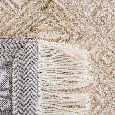 Luscious Ivory Hand-Tufted Wool Area Rug with Boho Motifs
