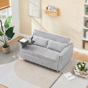 Dual functions corduroy sofa with pull-out and push-in, equipped with a movable tabletop and USB ports for use in living rooms bedrooms - 1 of 4
