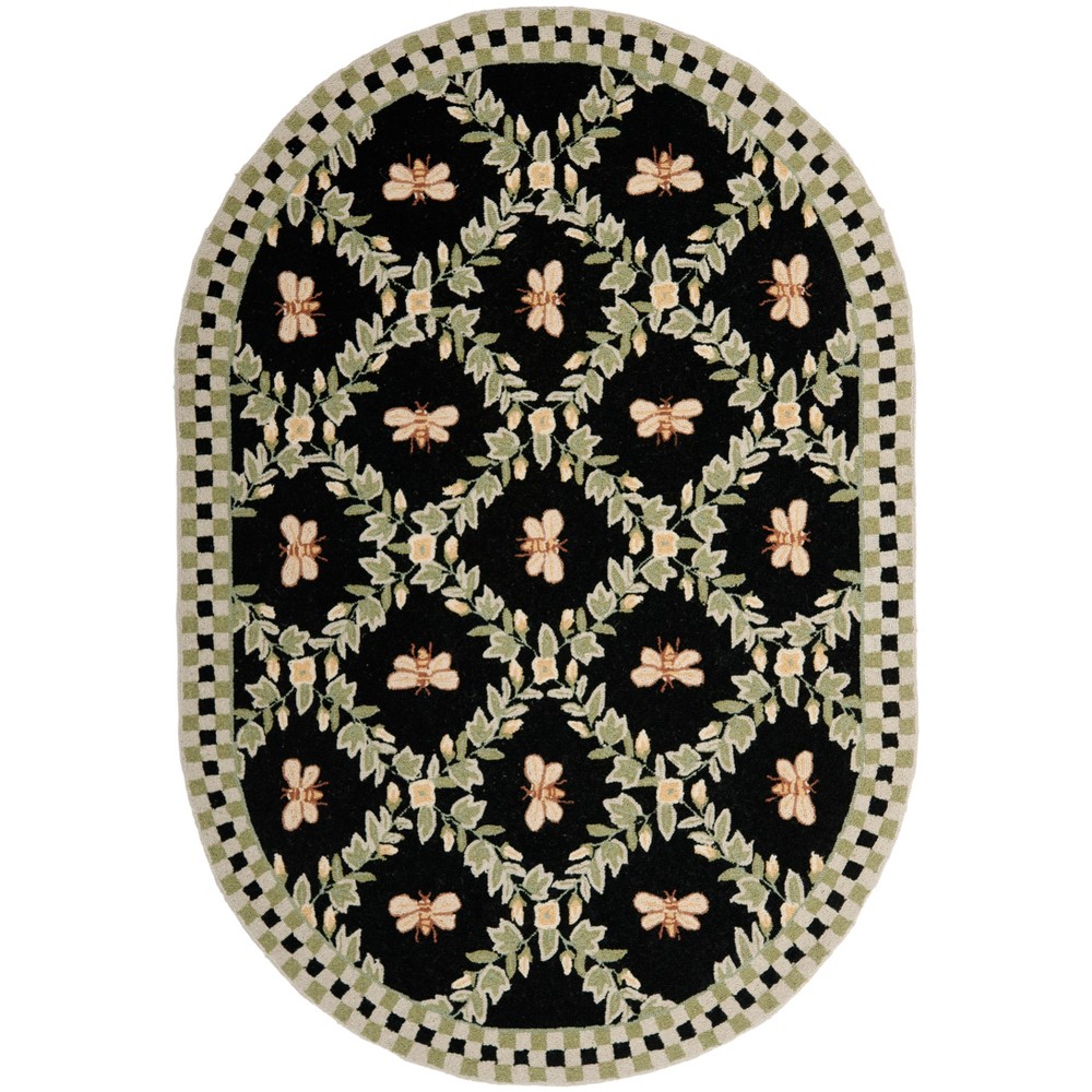 7'6inx9'6in Oval Bee Hooked Area Rug Black - Safavieh