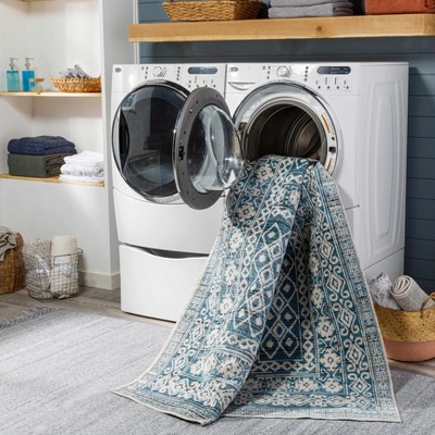 Gandy Blue and Cream Synthetic Rectangle Area Rug 6'7" x 9'