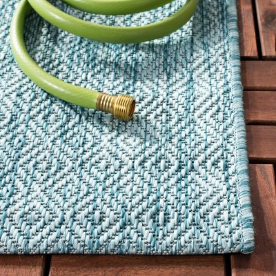 Aqua Delano Easy-Care 6'7" x 9'6" Synthetic Indoor/Outdoor Rug