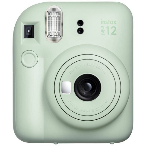 mint green polaroid instant camera