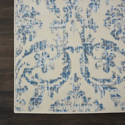 Elegant Ivory and Blue Damask 7' x 10' Synthetic Area Rug