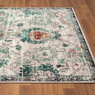 Green Floral Distressed 6' x 9' Synthetic Area Rug