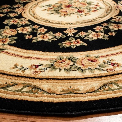 8' Round Black and Ivory Floral Synthetic Area Rug