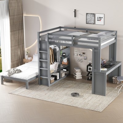 Grey bunk bed with ladder and study nook in a cozy bedroom