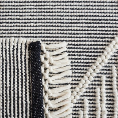 Handwoven Black and Ivory Wool 6' x 9' Area Rug