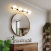 POWLIG 35.4" Black & Gold Modern Vanity Light - 4-Light Dimmable Bathroom Fixture with Milky White Glass Globe Shades - 2 of 4