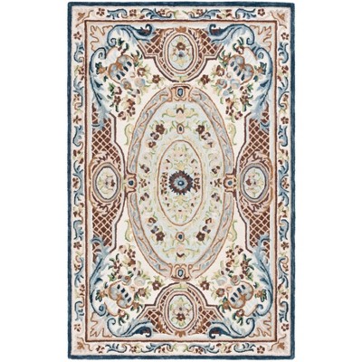 Aubusson AUB202 Handmade Tufted Area Rug - Ivory/Blue - 6' X 9' - Safavieh