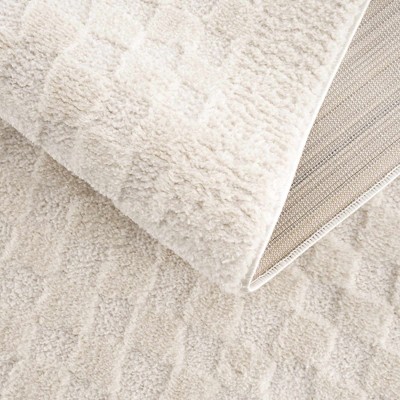 Ivory Geometric High Pile Polyester Area Rug 6'7" x 9'
