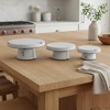 HomeRoots Set of Three White Metal Round Riser Trays - 2 of 4