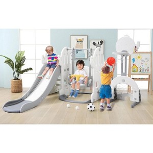 7-in-1 Freestanding Climber with Adjustable Swing, Basketball Hoop, Soccer, Golf & Ring Toss Games Indoor/Outdoor Activity Playground Center - 1 of 4