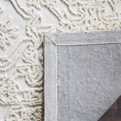 Elegant Ivory Tufted Wool 8' x 10' Handmade Area Rug