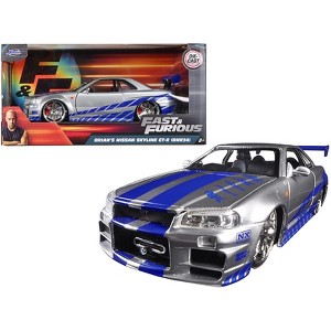 Brian's Nissan GTR Skyline R34 (RHD) Silver with Blue Stripes "Fast & Furious" Movie 1/24 Diecast Model Car by Jada - 1 of 3