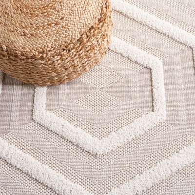 Ivory Geometric Flat Woven Synthetic Round Rug