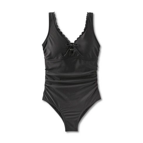 A mastectomy friendly one piece zip front swimsuit in classic