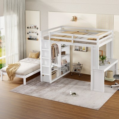 Wide view of white bunk bed with desk and ladder, in a bright room
