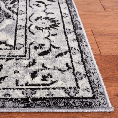 Brentwood Square Black/Ivory Hand-Knotted Synthetic Area Rug