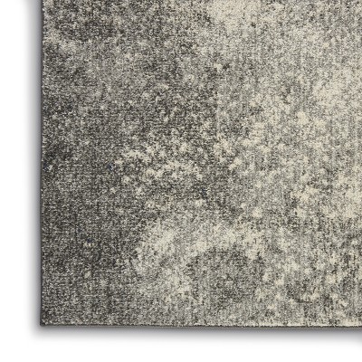Charcoal Ivory Abstract Synthetic 45x69 Medium Area Rug