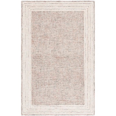 Ebony EBN425 Handmade Tufted Rug - Safavieh