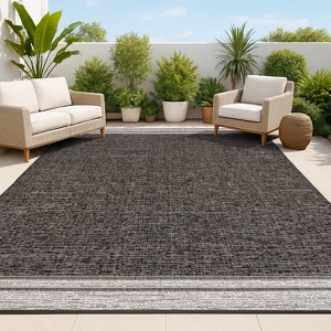 Alda Modern Minimalist Mingled Solid Indoor/Outdoor Area Rug - JONATHAN Y - 1 of 4