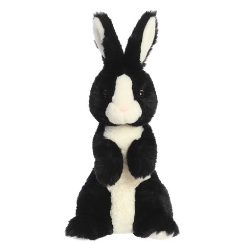 Rabbit! Rabbit! Rabbit! This cute little white bunny Rabbit figurine has  black-tipped ears and shiny black eyes.