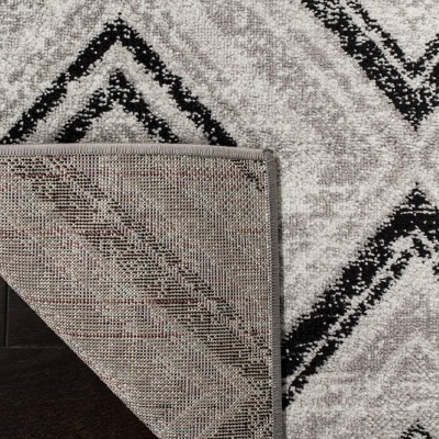 Skyler Silver Geometric Medallion Synthetic Area Rug