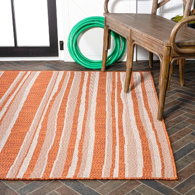 Castara Chic Orange & Cream Striped Synthetic 5x8 Area Rug