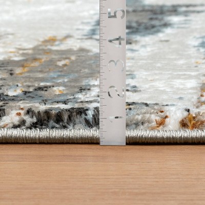 Blue and White Abstract Synthetic 5' x 7' Area Rug