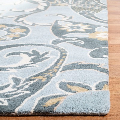 Wyndham Blue and Multicolor Hand-Tufted Wool Area Rug 5' x 8'