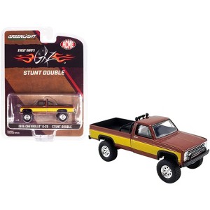1986 Chevrolet K-20 Pickup Truck Brown Met. w/Gold Stripes Stacey David's Fall Guy 1/64 Diecast Model Car by Greenlight for ACME - 1 of 4