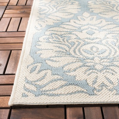 Aqua and Cream Medallion Synthetic Rectangular Area Rug