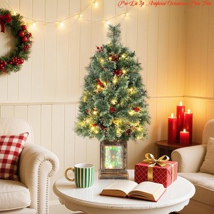 3 ft Pre-lit Christmas Tree, Potted Artificial Xmas Tree w/ 70 Lights & 16 Pinecones & 16 Red Berries - 1 of 4