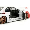 2002 Nissan Skyline GT-R (R34) RHD White w/Graphics and Ryu Figure "Street Fighter" Video Game 1/24 Diecast Model Car by Jada - 3 of 4