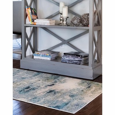 Luminous Light Blue Abstract Synthetic Indoor Rug, 10' 6" x 16' 5"