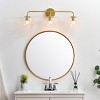 Elegant Lighting Genesis 3 light Brass and Clear Bath Sconce - 3 of 4