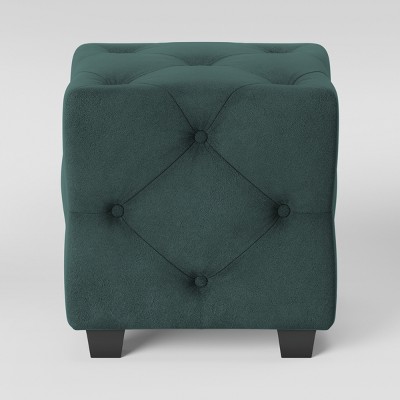 teal chair with ottoman