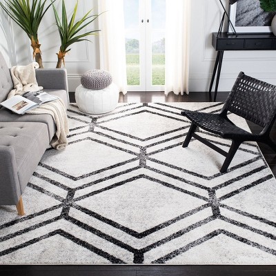 Ivory and Charcoal Geometric Synthetic Area Rug