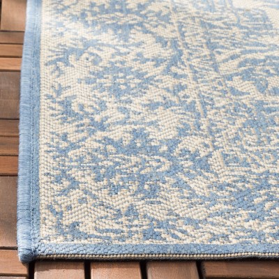 Valene Easy-Care Blue Synthetic 4' x 6' Outdoor Rug